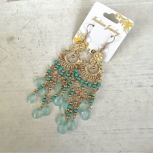 Gold tone and blue chandelier earrings